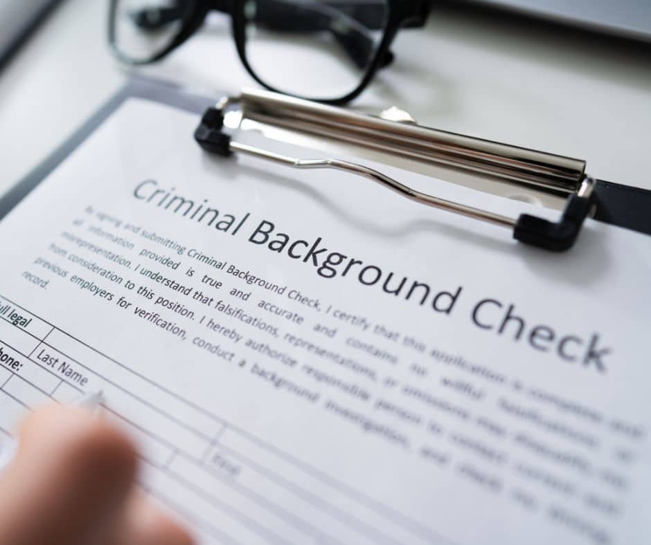 Criminal background check on a clipboard